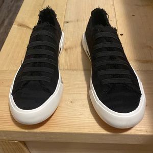 Brand new still in the box black slip on Rocket Dog Cotton shoes.  7.5.
